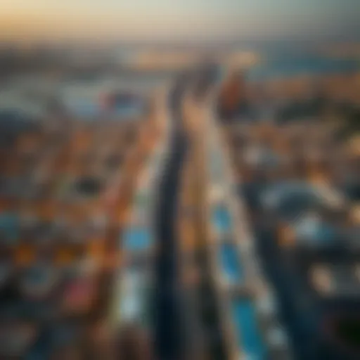 An aerial view showcasing the urban landscape of Al Nahda, highlighting the blend of Dubai and Sharjah.
