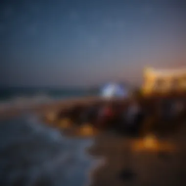 Audience enjoying a film under the stars, with the ocean waves gently lapping in the background.