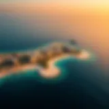 Aerial view of Al Hamra Falcon Island showcasing its pristine beaches and luxurious developments