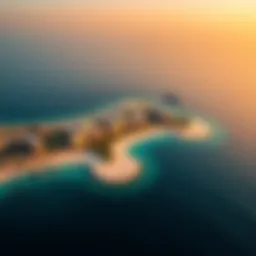 Aerial view of Al Hamra Falcon Island showcasing its pristine beaches and luxurious developments