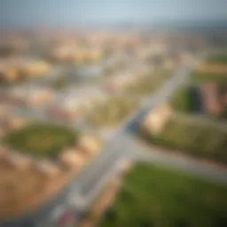 Aerial view of Qusais showcasing the urban layout and greenery