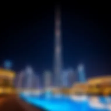 Night view of Amna Tower Night view of Amna Tower illuminated against the Dubai skyline